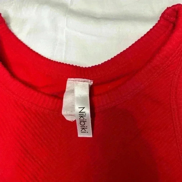 I’m selling a red Nikibiki crop top. - Picture 2 of 4